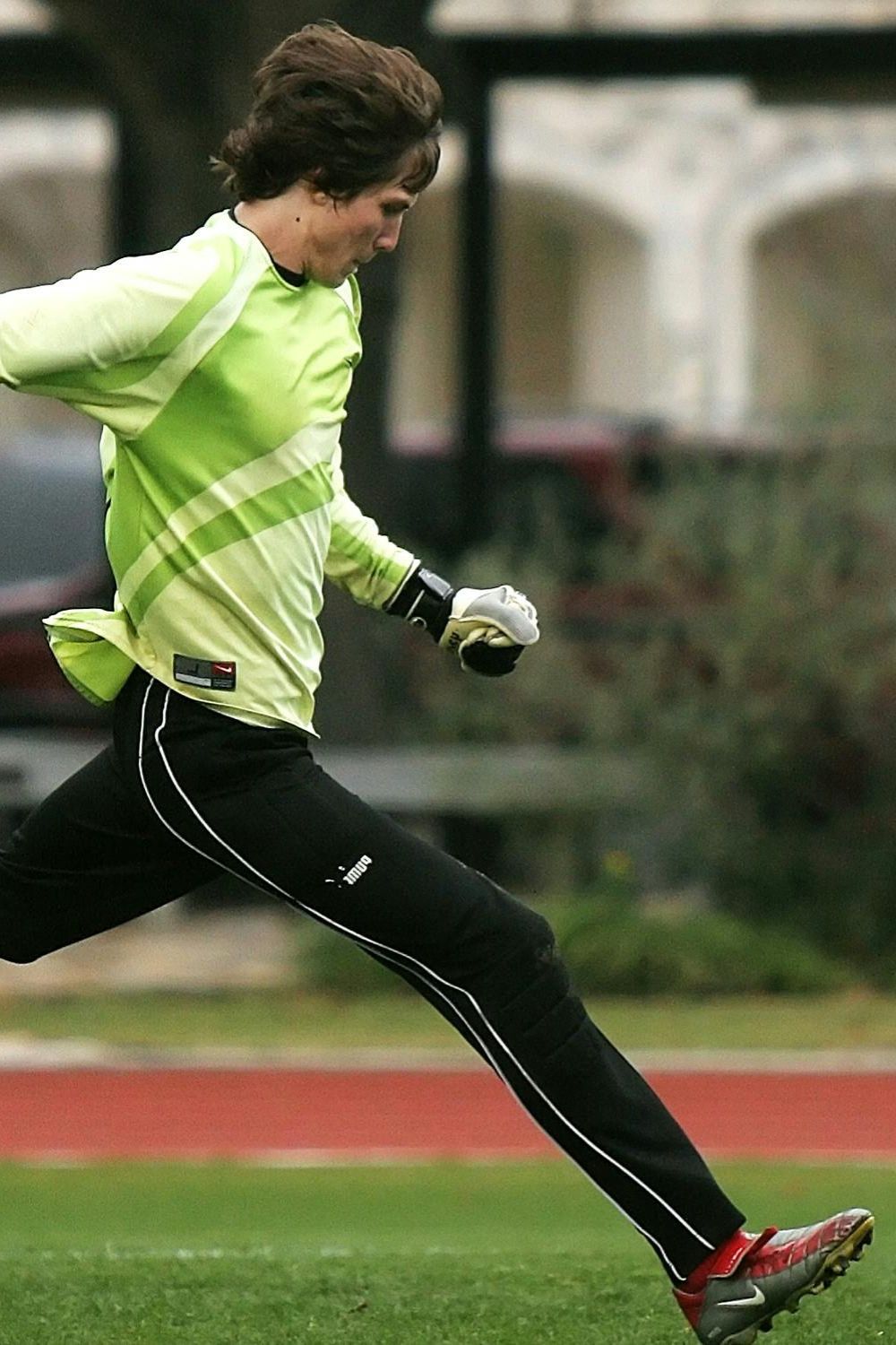 Man about to kick a soccer ball